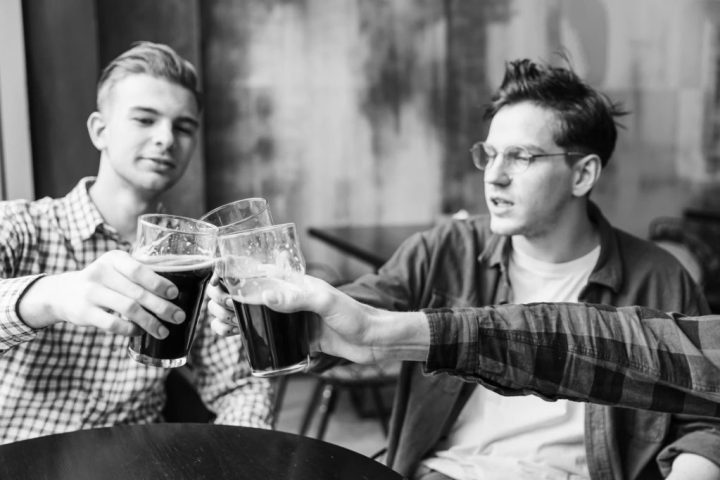 a person holding a plate of food