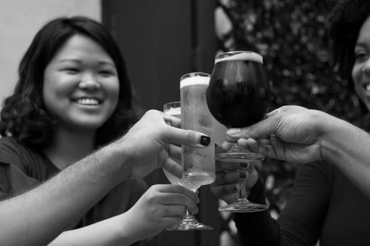 a woman holding a wine glass