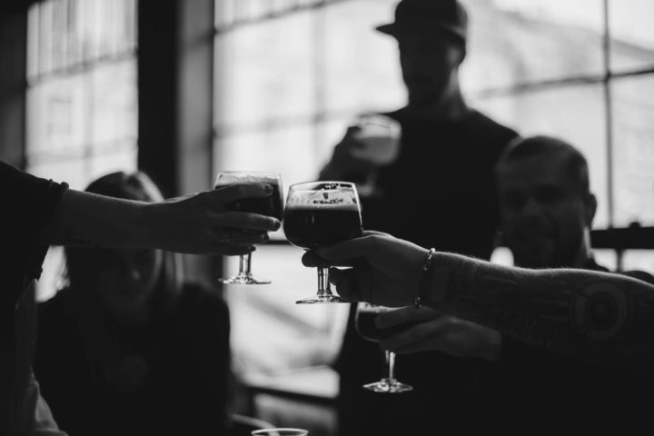 a person standing in front of a mirror posing for the camera