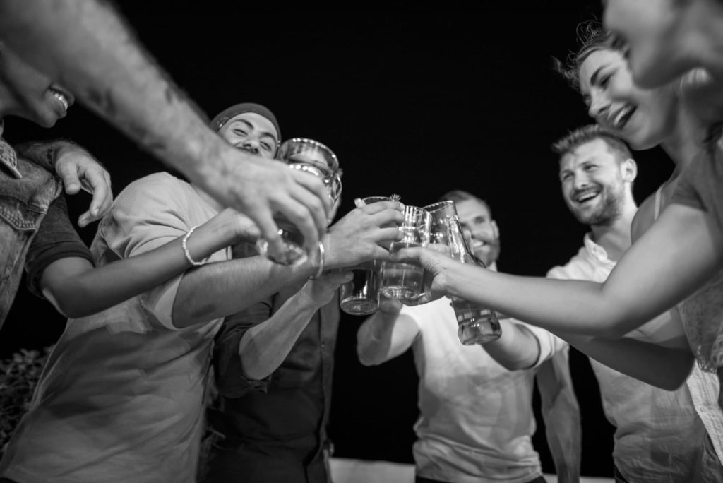 a group of people standing in front of a crowd