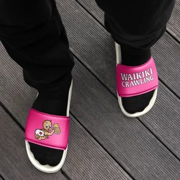 a person holding a bottle of beer